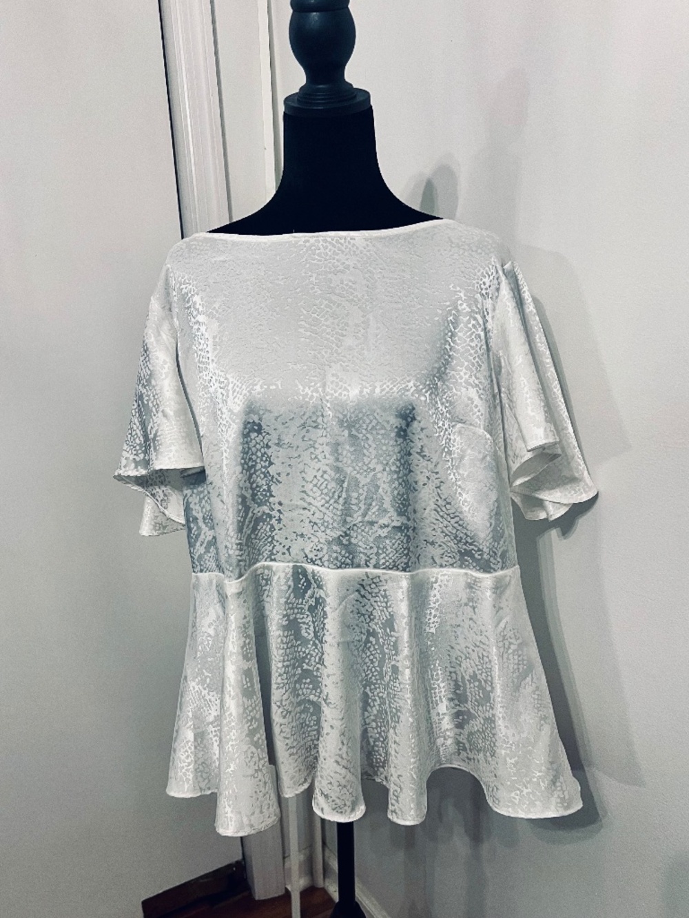 Torrid White Silky, Shiney Peplum Blouse.  Size 1 (14/16). Bell Sleeves.  B5/P79